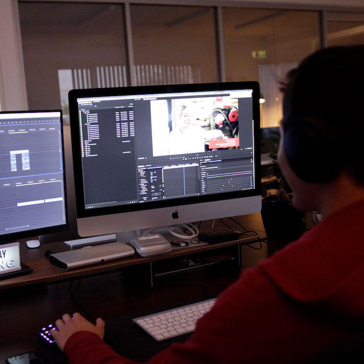 man film editing on mac desktop computer